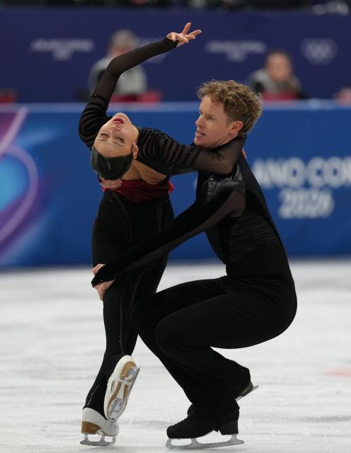 (260208) -- MILAN, Feb. 8, 2026 (Xinhua) -- Madison Chock (L)/Evan Bates of the United States perform during the free dance of ice dance skating for figure skating team event at the Milan-Cortina 2026 Olympic Winter Games in Milan, Italy, Feb. 7, 2026. (Xinhua/Cheng Min)