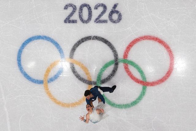 (260208) -- MILAN, Feb. 8, 2026 (Xinhua) -- Charlene Guignard (bottom)/Marco Fabbri of Italy perform during the free dance of ice dance skating for figure skating team event at the Milan-Cortina 2026 Olympic Winter Games in Milan, Italy, Feb. 7, 2026. (Xinhua/Li Ming)