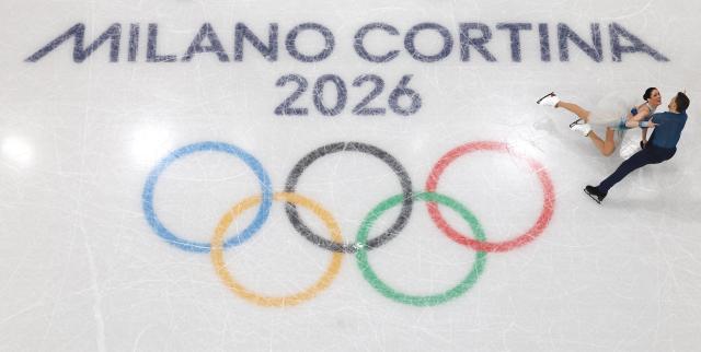 (260208) -- MILAN, Feb. 8, 2026 (Xinhua) -- Charlene Guignard (L)/Marco Fabbri of Italy perform during the free dance of ice dance skating for figure skating team event at the Milan-Cortina 2026 Olympic Winter Games in Milan, Italy, Feb. 7, 2026. (Xinhua/Li Ming)