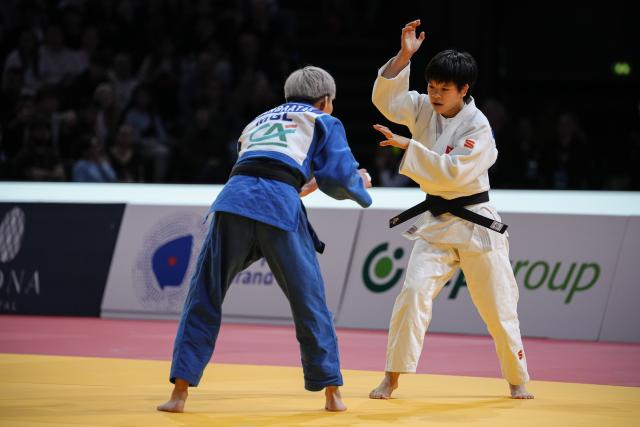 (260208) -- PARIS, Feb. 8, 2026 (Xinhua) -- Hui Xinran (R) of China competes with Narantsetseg Ganbaatar of Mongolia during the Grand Slam judo tournament women's -48kg bronze medal match in Paris, France, Feb. 7, 2026. (Photo by Aurelien Morissard/Xinhua)