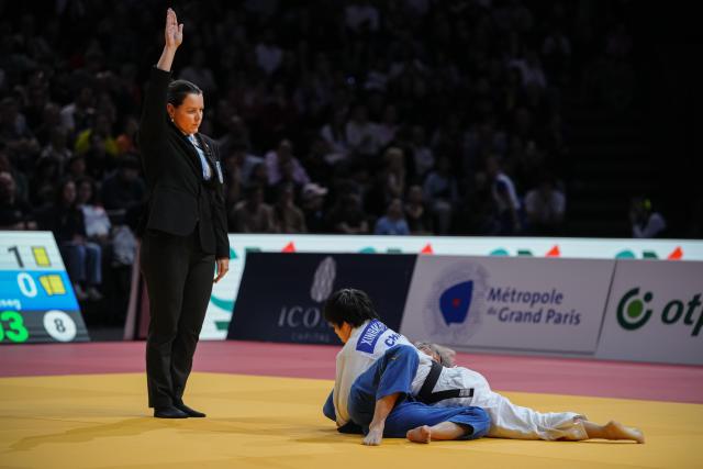 (260208) -- PARIS, Feb. 8, 2026 (Xinhua) -- Hui Xinran (top) of China competes with Narantsetseg Ganbaatar of Mongolia during the Grand Slam judo tournament women's -48kg bronze medal match in Paris, France, Feb. 7, 2026. (Photo by Aurelien Morissard/Xinhua)