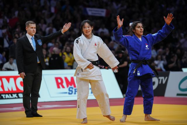 (260208) -- PARIS, Feb. 8, 2026 (Xinhua) -- Shirine Boukli (R) of France reacts after the Grand Slam judo tournament women's -48kg final match against Zhuang Wenna of China in Paris, France, Feb. 7, 2026. (Photo by Aurelien Morissard/Xinhua)