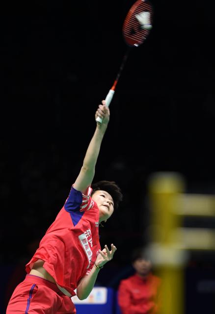 (260208) -- QINGDAO, Feb. 8, 2026 (Xinhua) -- Han Qianxi of China hits a return in the women's singles match against An Se Young of South Korea during the women's team final match between China and South Korea at Badminton Asia Team Championships 2026 in Qingdao, east China's Shandong Province, Feb. 8, 2026. (Xinhua/Li Ziheng)