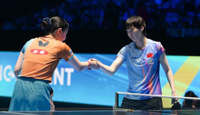 (260208) -- HAIKOU, Feb. 8, 2026 (Xinhua) -- Wang Manyu (R) greets Harimoto Miwa after the women's singles semifinal match between Wang Manyu of China and Harimoto Miwa of Japan at the ITTF-ATTU Asian Cup Haikou 2026 table tennis tournament in Haikou, south China's Hainan Province, Feb. 8, 2026. (Xinhua/Yang Guanyu)