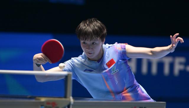 (260208) -- HAIKOU, Feb. 8, 2026 (Xinhua) -- Wang Manyu hits a return during the women's singles semifinal match between Wang Manyu of China and Harimoto Miwa of Japan at the ITTF-ATTU Asian Cup Haikou 2026 table tennis tournament in Haikou, south China's Hainan Province, Feb. 8, 2026. (Xinhua/Yang Guanyu)