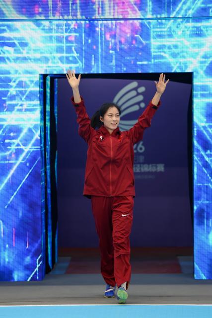 (260208) -- TIANJIN, Feb. 8, 2026 (Xinhua) -- Li Zhishuang of China greets the spectators before the women's long jump final at the 12th Asian Indoor Athletics Championships 2026 in Tianjin, north China, Feb. 8, 2026. (Xinhua/Sun Fanyue)