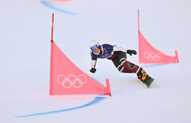 (260208) -- LIVIGNO, Feb. 8, 2026 (Xinhua) -- Kaylie Buck of Canada competes during the Snowboard Women's Parallel Giant Slalom Qualification at the Milan-Cortina 2026 Olympic Winter Games in Livigno, Italy, Feb. 8, 2026. (Xinhua/Zhang Hongxiang)