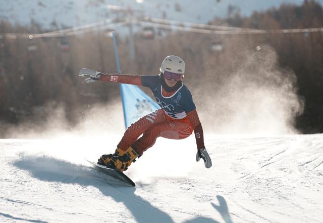 (260208) -- LIVIGNO, Feb. 8, 2026 (Xinhua) -- Switzerland's Ladina Caviezel competes during the Snowboard Women's Parallel Giant Slalom Qualification at the Milan-Cortina 2026 Olympic Winter Games in Livigno, Italy, Feb. 8, 2026. (Xinhua/Hu Chao)