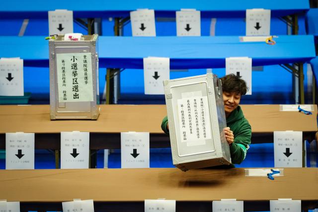 (260208) -- TOKYO, Feb. 8, 2026 (Xinhua) -- A staff member works at a counting station for the general election in Tokyo, Japan, Feb. 8, 2026. Japan's ruling coalition of Liberal Democratic Party and its partner Japan Innovation Party is expected to secure a majority of seats in the House of Representatives in Sunday's general election, the NHK exit poll projected. (Xinhua/Jia Haocheng)