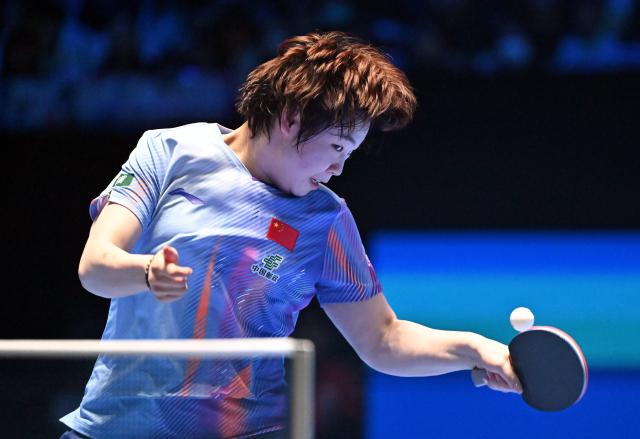 (260208) -- HAIKOU, Feb. 8, 2026 (Xinhua) -- Kuai Man hits a return during the women's singles position 3-4 match between Harimoto Miwa of Japan and Kuai Man of China at the ITTF-ATTU Asian Cup Haikou 2026 table tennis tournament in Haikou, south China's Hainan Province, Feb. 8, 2026. (Xinhua/Guo Cheng)