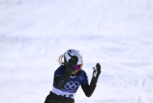 (260208) -- LIVIGNO, Feb. 8, 2026 (Xinhua) -- Bai Xinhui of China reacts during the Snowboard Women's Parallel Giant Slalom Qualification at the Milan-Cortina 2026 Olympic Winter Games in Livigno, Italy, Feb. 8, 2026. (Xinhua/Zhang Hongxiang)