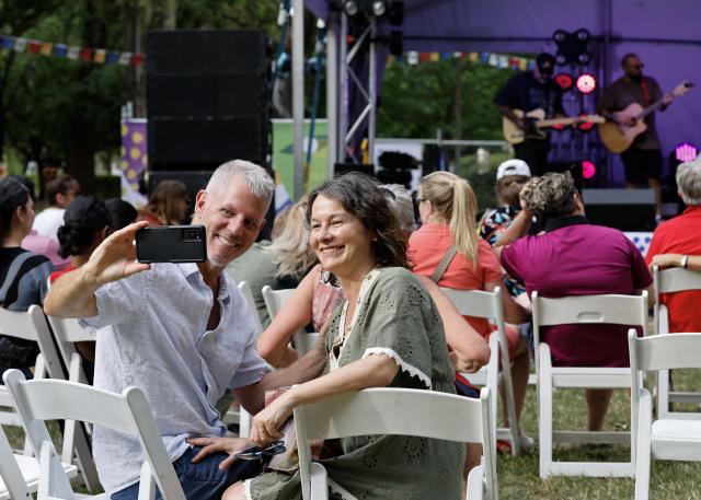 (260208) -- CANBERRA, Feb. 8, 2026 (Xinhua) -- A couple takes a selfie at the 2026 National Multicultural Festival in Canberra, Australia, Feb. 7, 2026. The festival, held from Feb. 6 to 8 in Canberra, attracted visitors with music, dance performances and delicious food. (Photo by Chu Chen/Xinhua)