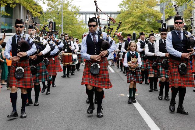 (260208) -- CANBERRA, Feb. 8, 2026 (Xinhua) -- Bagpipers attend the 2026 National Multicultural Festival in Canberra, Australia, Feb. 7, 2026. The festival, held from Feb. 6 to 8 in Canberra, attracted visitors with music, dance performances and delicious food. (Photo by Chu Chen/Xinhua)