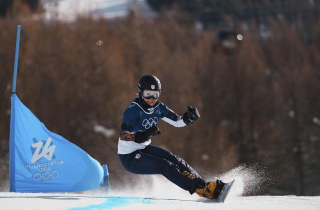 (260208) -- LIVIGNO, Feb. 8, 2026 (Xinhua) -- Japan's Miki Tsubaki competes during the Snowboard Women's Parallel Giant Slalom 1/8 Finals at the Milan-Cortina 2026 Olympic Winter Games in Livigno, Italy, Feb. 8, 2026. (Xinhua/Hu Chao)