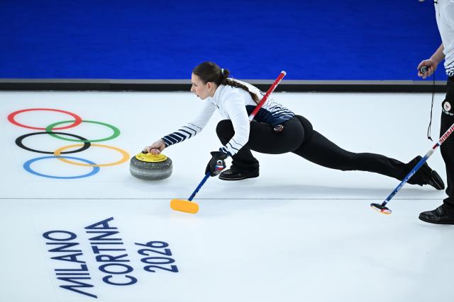 (260208) -- CORTINA D'AMPEZZO, Feb. 8, 2026 (Xinhua) -- Julie Zelingrova (L)/Vit Chabicovsky of the Czech Republic compete against Kristin Skaslien/Magnus Nedregotten of Norway during the curling mixed doubles round robin session 10 match of the 2026 Milan-Cortina Winter Olympics in Cortina D'Ampezzo, Italy, Feb. 8, 2026. (Xinhua/Lian Yi)