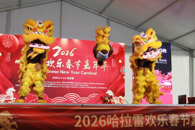 (260208) -- HARARE, Feb. 8, 2026 (Xinhua) -- Zimbabwean artists perform traditional Chinese lion dance at a carnival to celebrate the Chinese New Year in Harare, Zimbabwe, on Feb. 7, 2026. Zimbabweans on Saturday were treated to Chinese cuisine and traditional performances at a carnival held in Harare, Zimbabwe's capital, to celebrate the upcoming Chinese New Year.
   TO GO WITH "Carnival held in Zimbabwe to celebrate Chinese New Year" (Photo by Tafara Mugwara/Xinhua)