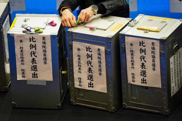 (260208) -- TOKYO, Feb. 8, 2026 (Xinhua) -- A staff member works at a counting station for the general election in Tokyo, Japan, Feb. 8, 2026. Japan's ruling coalition of Liberal Democratic Party (LDP) and its partner Japan Innovation Party is expected to secure a majority of seats in the House of Representatives in Sunday's general election, public broadcaster NHK said, citing its exit poll. (Xinhua/Jia Haocheng)