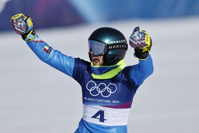 (260208) -- LIVIGNO, Feb. 8, 2026 (Xinhua) -- Lucia Dalmasso of Italy celebrates during the Snowboard Women's Parallel Giant Slalom Finals at the Milan-Cortina 2026 Olympic Winter Games in Livigno, Italy, Feb. 8, 2026. (Xinhua/Wang Peng)