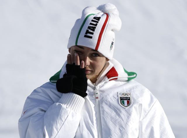 (260208) -- LIVIGNO, Feb. 8, 2026 (Xinhua) -- Bronze medalist Lucia Dalmasso of Italy reacts on the podium after the Snowboard Women's Parallel Giant Slalom Finals at the Milan-Cortina 2026 Olympic Winter Games in Livigno, Italy, Feb. 8, 2026. (Xinhua/Wang Peng)