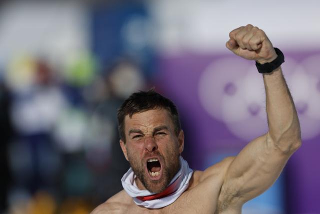 (260208) -- LIVIGNO, Feb. 8, 2026 (Xinhua) -- Gold medalist Benjamin Karl of Austria celebrates after winning the Snowboard Men's Parallel Giant Slalom final at the Milan-Cortina 2026 Olympic Winter Games in Livigno, Italy, Feb. 8, 2026. (Xinhua/Wang Peng)