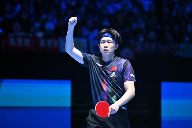 (260208) -- HAIKOU, Feb. 8, 2026 (Xinhua) -- Wang Chuqin celebrates scoring during the men's singles final between Wang Chuqin of China and Harimoto Tomokazu of Japan at the ITTF-ATTU Asian Cup Haikou 2026 table tennis tournament in Haikou, south China's Hainan Province, Feb. 8, 2026. (Xinhua/Guo Cheng)