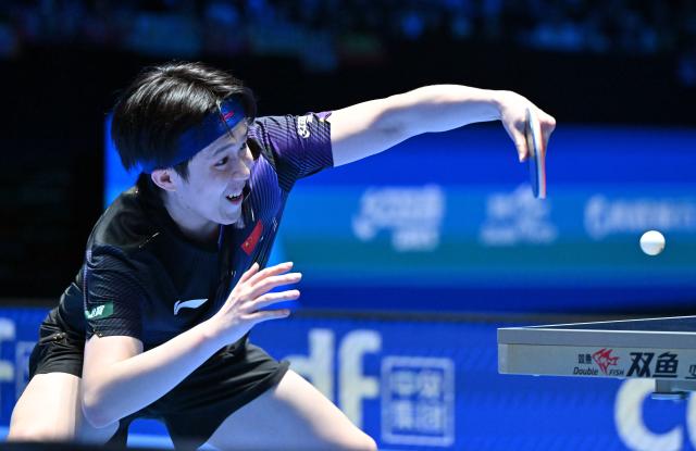 (260208) -- HAIKOU, Feb. 8, 2026 (Xinhua) -- Wang Chuqin hits a return during the men's singles final between Wang Chuqin of China and Harimoto Tomokazu of Japan at the ITTF-ATTU Asian Cup Haikou 2026 table tennis tournament in Haikou, south China's Hainan Province, Feb. 8, 2026. (Xinhua/Guo Cheng)