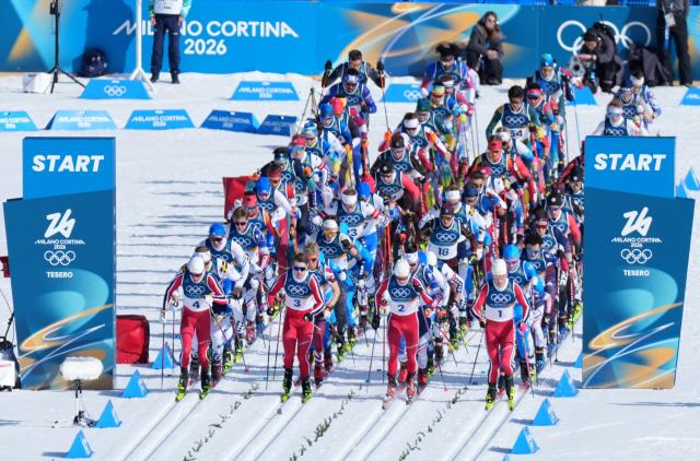 (260208) -- TESERO, Feb. 8, 2026 (Xinhua) -- Athletes compete during the cross-country skiing men's 10km+10km skiathlon at the Milan-Cortina 2026 Olympic Winter Games in Tesero, Italy, Feb. 8, 2026. (Xinhua/He Canling)