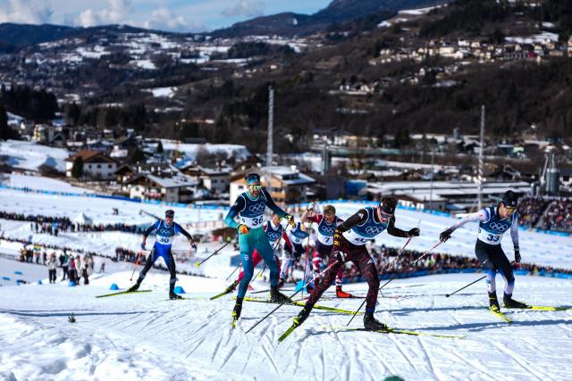 (260208) -- TESERO, Feb. 8, 2026 (Xinhua) -- Athletes compete during the cross-country skiing men's 10km+10km skiathlon at the Milan-Cortina 2026 Olympic Winter Games in Tesero, Italy, Feb. 8, 2026. (Xinhua/Peng Ziyang)