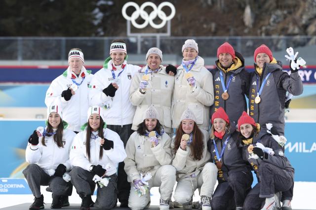 (260208) -- ANTERSELVA, Feb. 8, 2026 (Xinhua) -- Gold medalists Julia Simon, Lou Jeanmonnot, Quentin Fillon Maillet, and Eric Perrot of France, silver medalists Lisa Vittozzi, Dorothea Wierer, Lukas Hofer and Tommaso Giacomel of Italy, and bronze medalists Franziska Preuss, Vanessa Voigt, Philipp Nawrath and Justus Strelow of Germany pose for a group photo during the awarding ceremony of the biathlon mixed relay 4 x 6km (M+W) at the Milan-Cortina 2026 Olympic Winter Games in Anterselva, Italy, Feb. 8, 2026. (Xinhua/Zhang Tao)