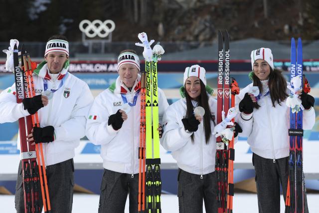 (260208) -- ANTERSELVA, Feb. 8, 2026 (Xinhua) -- Silver medalists Lisa Vittozzi (1st R), Dorothea Wierer (2nd R), Lukas Hofer (2nd L) and Tommaso Giacomel of Italy attend the awarding ceremony of the biathlon mixed relay 4 x 6km (M+W) at the Milan-Cortina 2026 Olympic Winter Games in Anterselva, Italy, Feb. 8, 2026. (Xinhua/Zhang Tao)