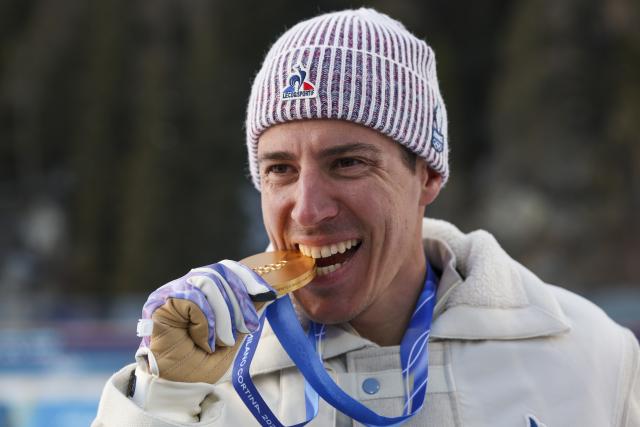 (260208) -- ANTERSELVA, Feb. 8, 2026 (Xinhua) -- Quentin Fillon Maillet of France celebrates during the awarding ceremony of the biathlon mixed relay 4 x 6km (M+W) at the Milan-Cortina 2026 Olympic Winter Games in Anterselva, Italy, Feb. 8, 2026. (Xinhua/Zhang Tao)