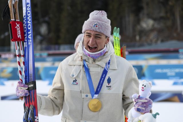 (260208) -- ANTERSELVA, Feb. 8, 2026 (Xinhua) -- Eric Perrot of France celebrates during the awarding ceremony of the biathlon mixed relay 4 x 6km (M+W) at the Milan-Cortina 2026 Olympic Winter Games in Anterselva, Italy, Feb. 8, 2026. (Xinhua/Zhang Tao)