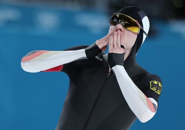 (260208) -- MILAN, Feb. 8, 2026 (Xinhua) -- Gabriel Gross of Germany reacts after the speed skating men's 5000m match at the Milan-Cortina 2026 Olympic Winter Games in Milan, Italy, Feb. 8, 2026. (Xinhua/Li Jing)