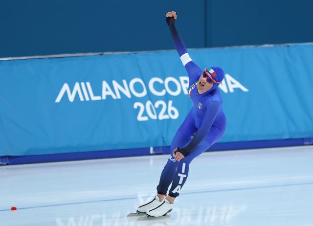 (260208) -- MILAN, Feb. 8, 2026 (Xinhua) -- Riccardo Lorello of Italy celebrates after the speed skating men's 5000m match at the Milan-Cortina 2026 Olympic Winter Games in Milan, Italy, Feb. 8, 2026. (Xinhua/Li Jing)