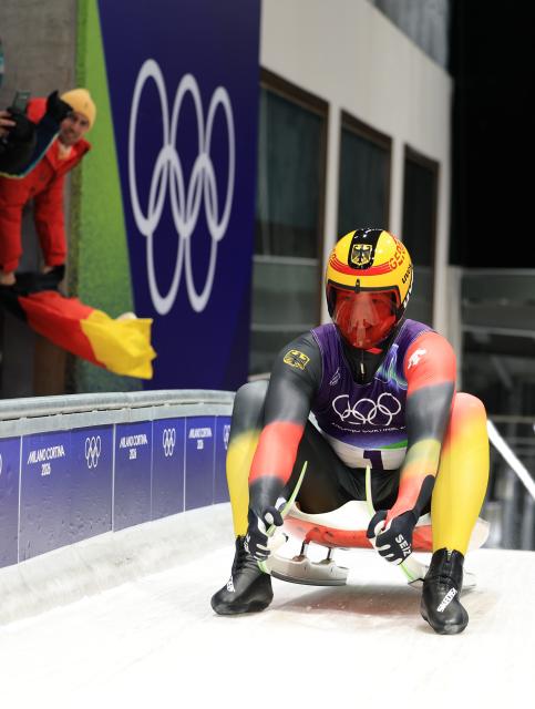 (260208) -- CORTINA D'AMPEZZO, Feb. 8, 2026 (Xinhua) -- Max Langenhan of Germany celebrates after the luge men's singles run 4 at the Milan-Cortina 2026 Olympic Winter Games in Cortina, Italy, Feb. 8, 2026. (Xinhua/Ding Xu)