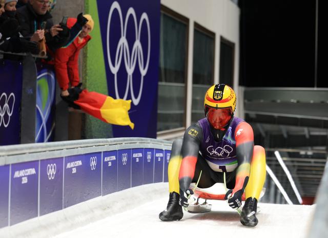 (260208) -- CORTINA D'AMPEZZO, Feb. 8, 2026 (Xinhua) -- Max Langenhan of Germany celebrates after the luge men's singles run 4 at the Milan-Cortina 2026 Olympic Winter Games in Cortina, Italy, Feb. 8, 2026. (Xinhua/Ding Xu)