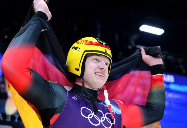 (260208) -- CORTINA D'AMPEZZO, Feb. 8, 2026 (Xinhua) -- Max Langenhan of Germany celebrates after the luge men's singles match at the Milan-Cortina 2026 Olympic Winter Games in Cortina, Italy, Feb. 8, 2026. (Xinhua/Ding Xu)