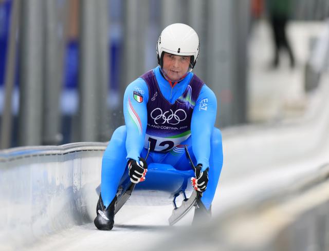 (260208) -- CORTINA D'AMPEZZO, Feb. 8, 2026 (Xinhua) -- Dominik Fischnaller of Italy passes the finish line during the luge men's singles run 3 at the Milan-Cortina 2026 Olympic Winter Games in Cortina, Italy, Feb. 8, 2026. (Xinhua/Ding Xu)