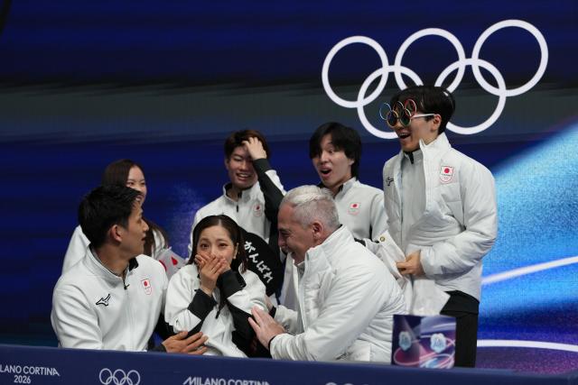 (260208) -- MILAN, Feb. 8, 2026 (Xinhua) -- Miura Riku (C front)/Kihara Ryuichi (L front) of Japan react after their performance during the figure skating team event pair skating free skating of the Milan-Cortina 2026 Olympic Winter Games in Milan, Italy, Feb. 8, 2026. (Xinhua/Xue Yuge)
