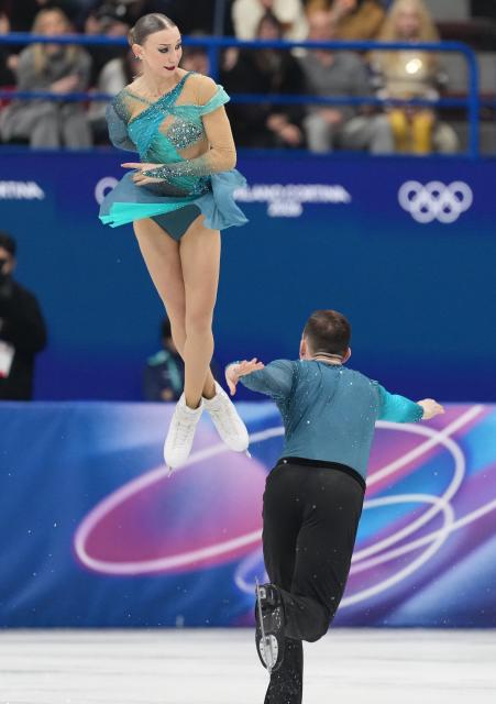 (260208) -- MILAN, Feb. 8, 2026 (Xinhua) -- Anastasiia Metelkina (top)/Luka Berulava of Georgia perform during the figure skating team event pair skating free skating of the Milan-Cortina 2026 Olympic Winter Games in Milan, Italy, Feb. 8, 2026. (Xinhua/Xue Yuge)