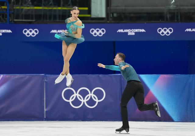 (260208) -- MILAN, Feb. 8, 2026 (Xinhua) -- Anastasiia Metelkina (top)/Luka Berulava of Georgia perform during the figure skating team event pair skating free skating of the Milan-Cortina 2026 Olympic Winter Games in Milan, Italy, Feb. 8, 2026. (Xinhua/Xue Yuge)