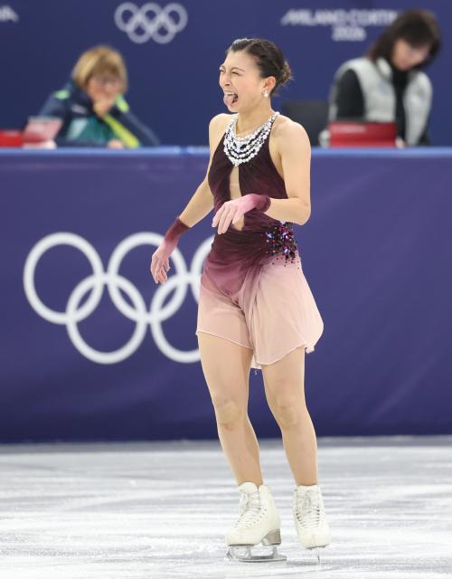 (260208) -- MILAN, Feb. 8, 2026 (Xinhua) -- Sakamoto Kaori of Japan reacts during the women single skating free skating of the figure skating team event of the Milan-Cortina 2026 Olympic Winter Games in Milan, Italy, Feb. 8, 2026. (Xinhua/Li Ming)