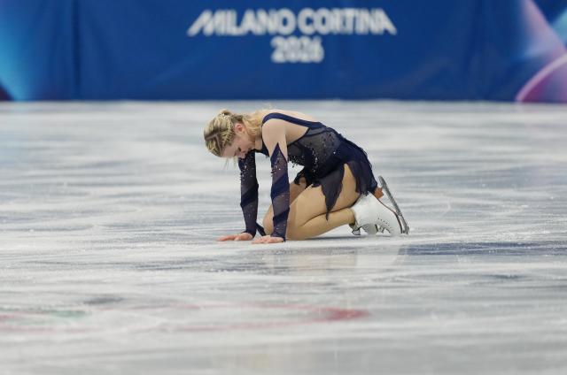 (260208) -- MILAN, Feb. 8, 2026 (Xinhua) -- Amber Glenn of the United States reacts after her performance during the figure skating team event women single skating free skating of the Milan-Cortina 2026 Olympic Winter Games in Milan, Italy, Feb. 8, 2026. (Xinhua/Xue Yuge)