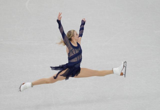 (260208) -- MILAN, Feb. 8, 2026 (Xinhua) -- Amber Glenn of the United States competes during the figure skating team event women single skating free skating of the Milan-Cortina 2026 Olympic Winter Games in Milan, Italy, Feb. 8, 2026. (Xinhua/Cheng Min)