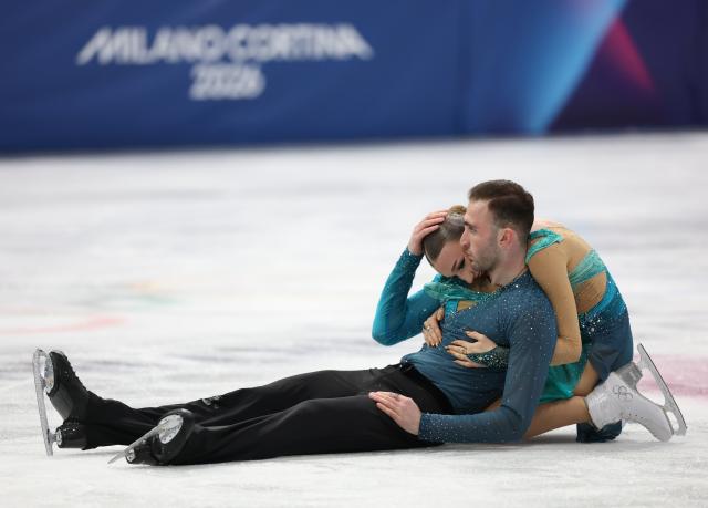 (260208) -- MILAN, Feb. 8, 2026 (Xinhua) -- Anastasiia Metelkina (R)/Luka Berulava of Georgia compete during the free skating of pair skating for figure skating team event at the Milan-Cortina 2026 Olympic Winter Games in Milan, Italy, Feb. 8, 2026. (Xinhua/Li Ming)