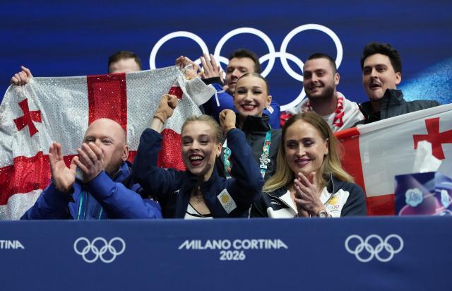 (260208) -- MILAN, Feb. 8, 2026 (Xinhua) -- Anastasiia Gubanova (C front) of Georgia reacts after her performance during the figure skating team event women single skating free skating of the Milan-Cortina 2026 Olympic Winter Games in Milan, Italy, Feb. 8, 2026. (Xinhua/Xue Yuge)