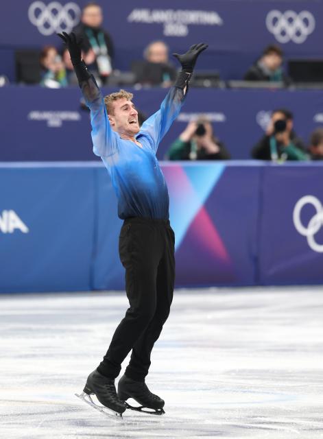(260208) -- MILAN, Feb. 8, 2026 (Xinhua) -- Matteo Rizzo of Italy celebrates after his performance during the figure skating team event men single skating free skating of the Milan-Cortina 2026 Olympic Winter Games in Milan, Italy, Feb. 8, 2026. (Xinhua/Li Ming)