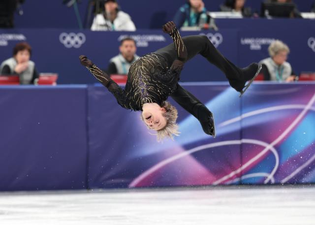 (260208) -- MILAN, Feb. 8, 2026 (Xinhua) -- Ilia Malinin of United States competes during the figure skating team event men single skating free skating of the Milan-Cortina 2026 Olympic Winter Games in Milan, Italy, Feb. 8, 2026. (Xinhua/Li Ming)