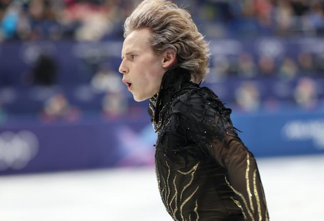 (260208) -- MILAN, Feb. 8, 2026 (Xinhua) -- Ilia Malinin of United States competes during the figure skating team event men single skating free skating of the Milan-Cortina 2026 Olympic Winter Games in Milan, Italy, Feb. 8, 2026. (Xinhua/Li Ming)