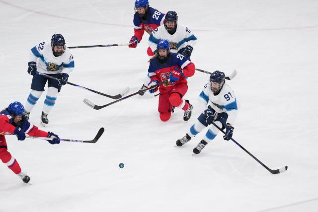 (260208) -- MILAN, Feb. 8, 2026 (Xinhua) -- Julia Liikala (1st R) of Finland competes during the ice hockey women's preliminary round group A match between the Czech Republic and Finland at the Milan-Cortina 2026 Olympic Winter Games in Milan, Italy, Feb. 8, 2026. (Xinhua/Tao Xiyi)